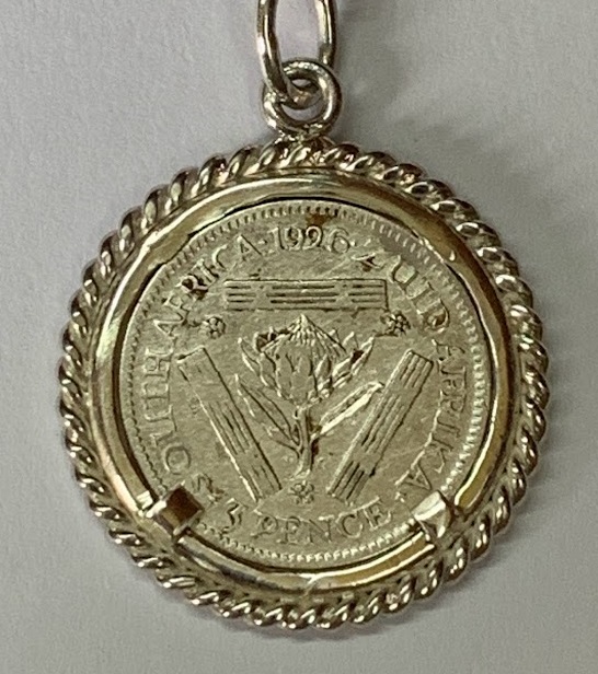 silver-pence-in-coin-frame