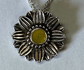 silver-sunflower-pendant-with-ashes-in-resin